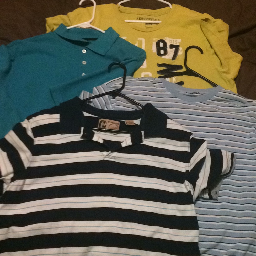 4 Men’s XL  and one XXL shirts.  Good condition.